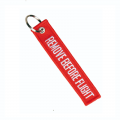 Portachiavi rosso remove before flight